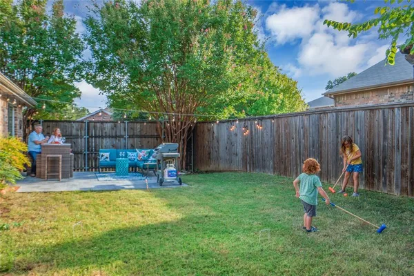 a garden view with a seating space