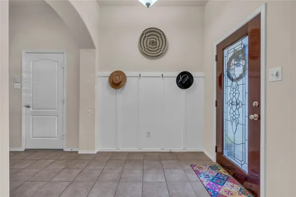 a view of entryway with wooden floor