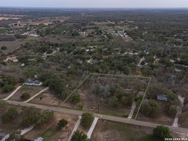 135 Savannah Ridge Von Ormy, TX 78073 - Photo 42 of 45 an aerial view of residential house with parking space