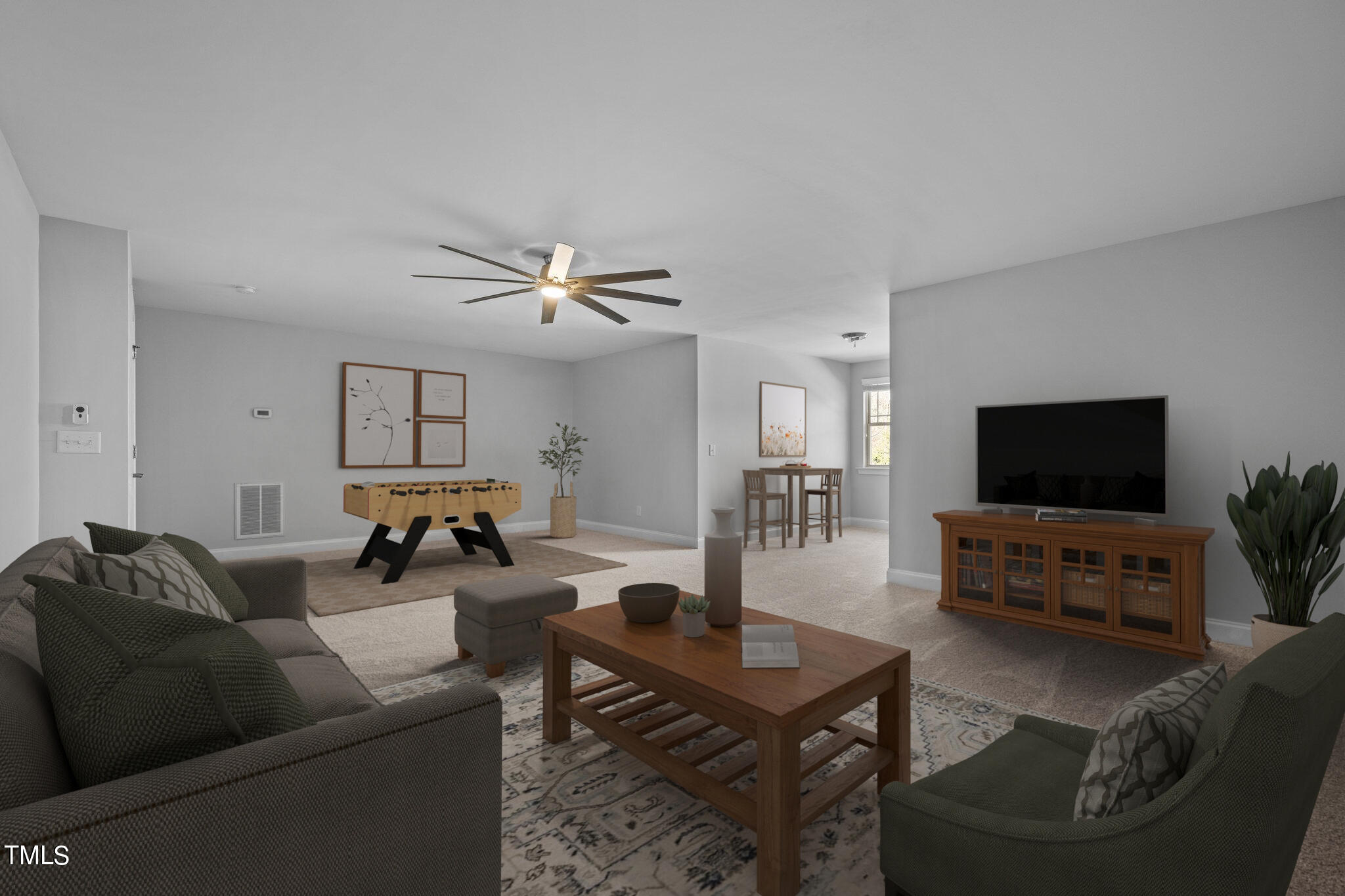 95 Windy Creek Drive Willow Spring, NC 27592 - Photo 31 of 55 a living room with furniture and a flat screen tv