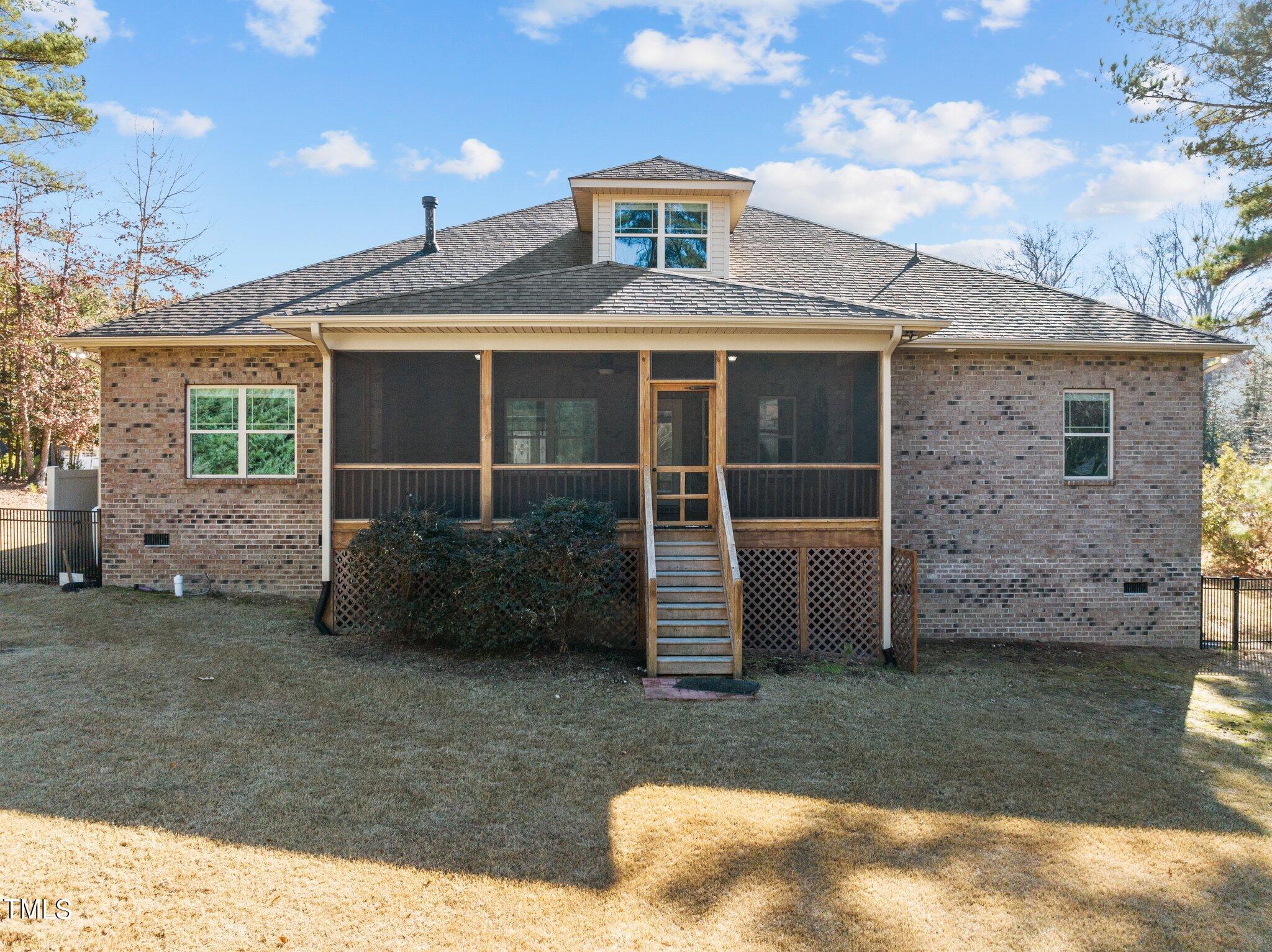 95 Windy Creek Drive Willow Spring, NC 27592 - Photo 40 of 55 a front view of a house with a yard