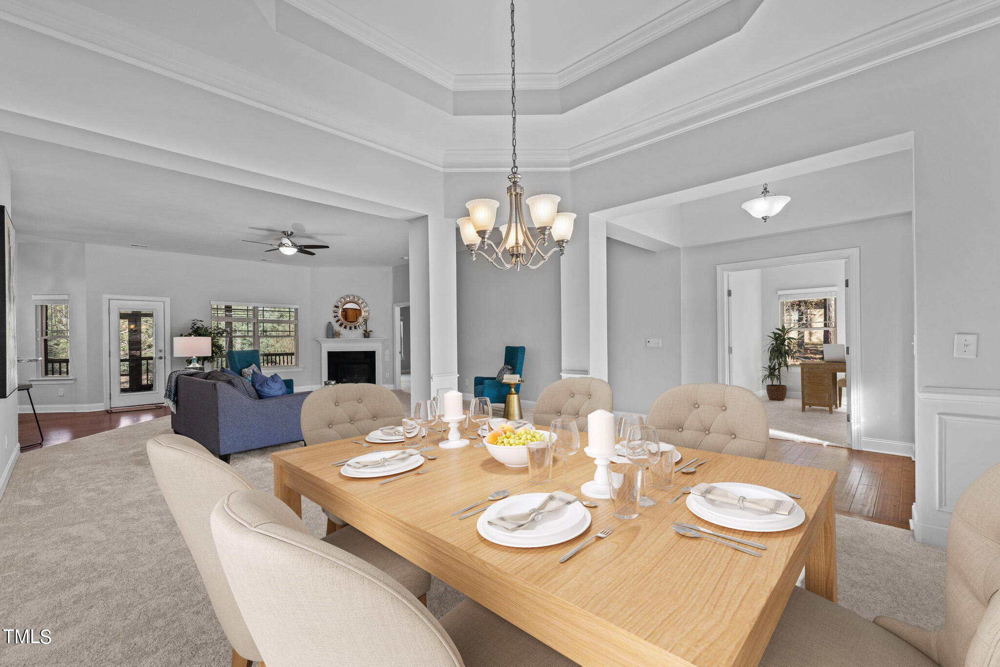 95 Windy Creek Drive Willow Spring, NC 27592 - Photo 4 of 55 a dining room with furniture and a chandelier