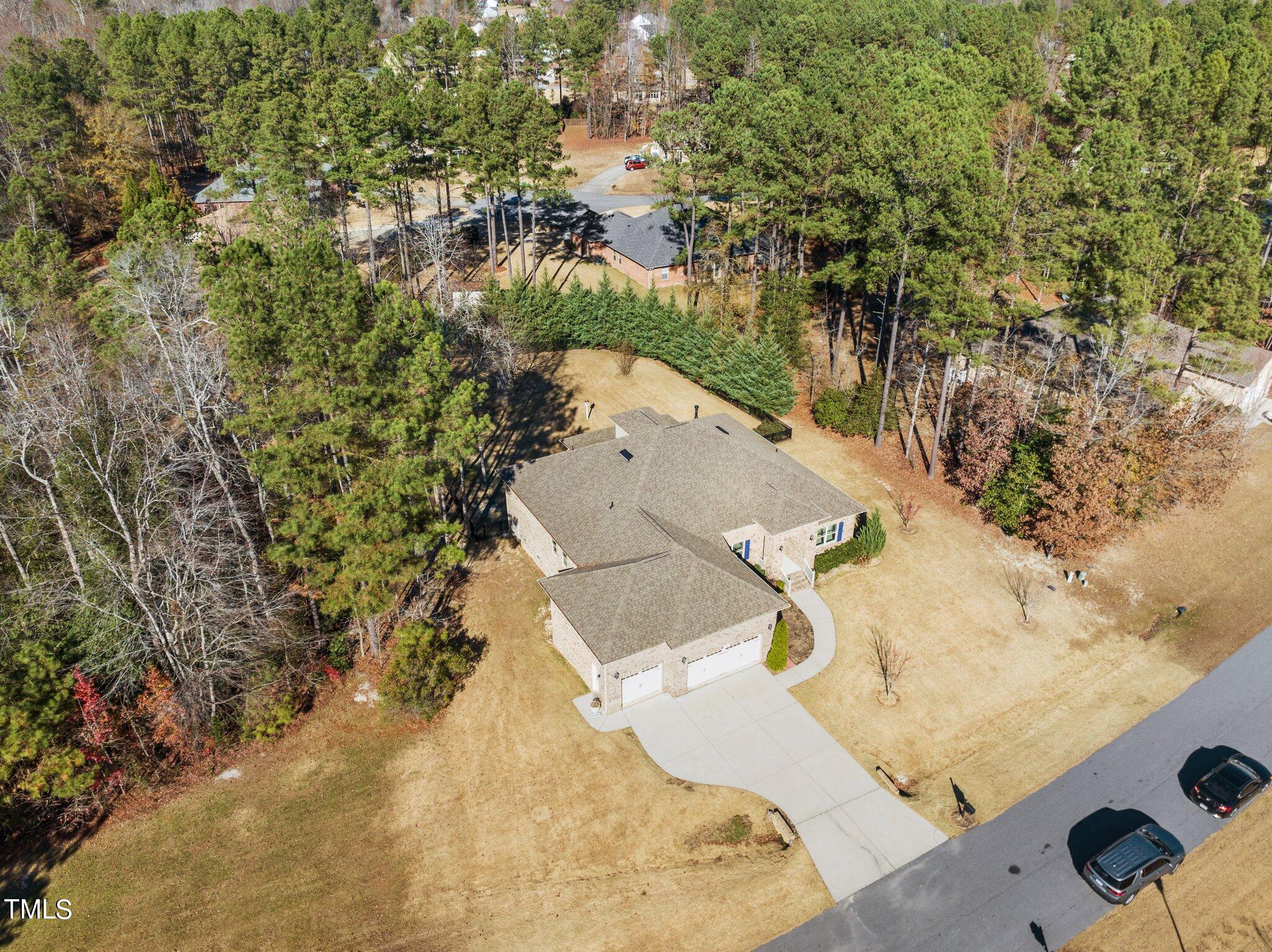 95 Windy Creek Drive Willow Spring, NC 27592 - Photo 50 of 55 a view of a yard in front of house