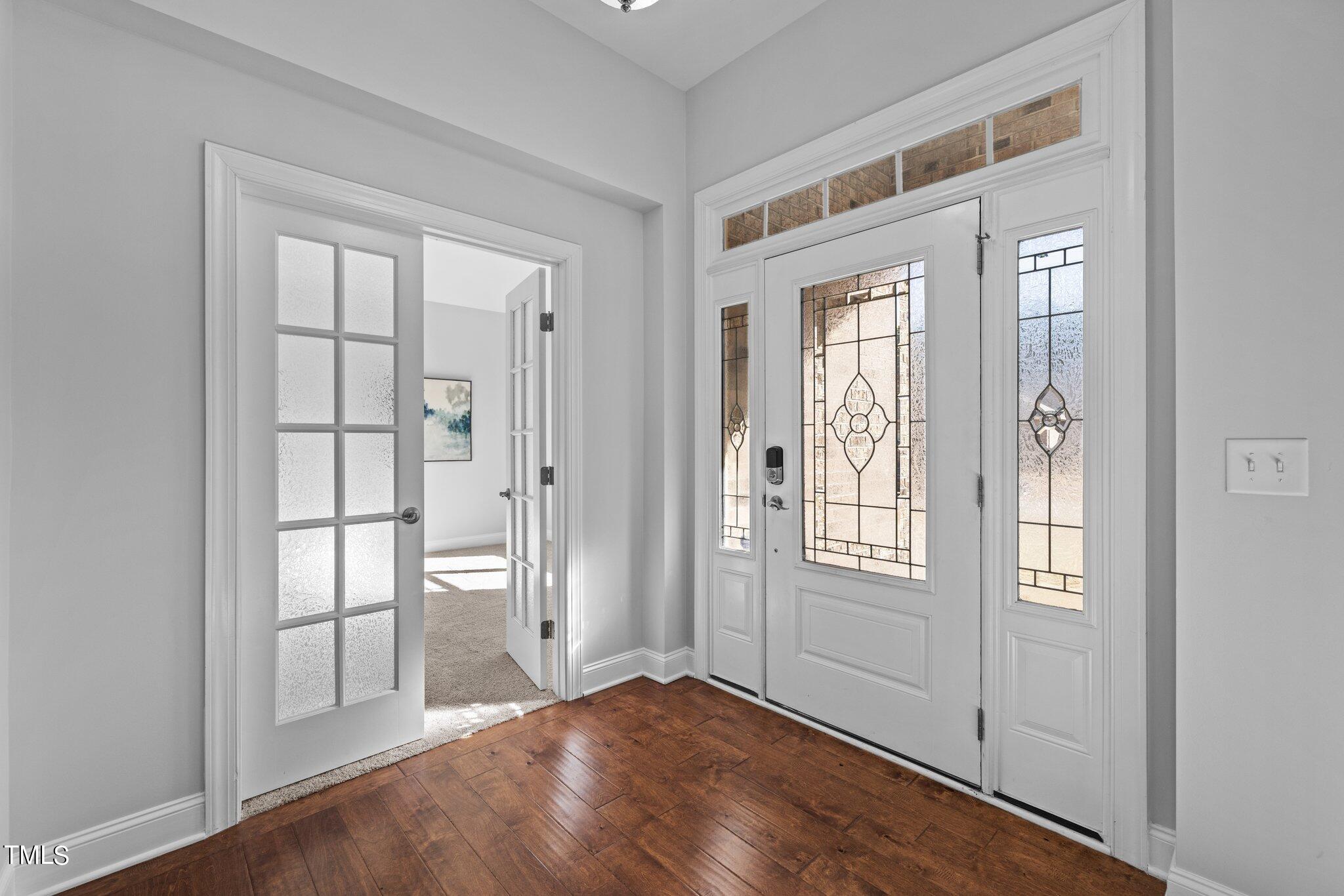 95 Windy Creek Drive Willow Spring, NC 27592 - Photo 5 of 55 an empty room with windows and closet