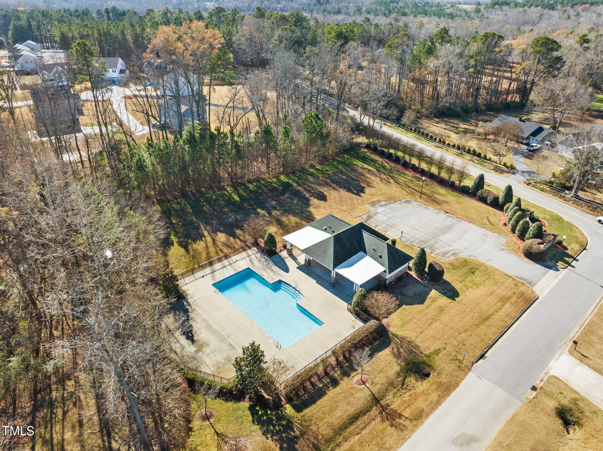 95 Windy Creek Drive Willow Spring, NC 27592 - Photo 53 of 55 a view of a house with pool