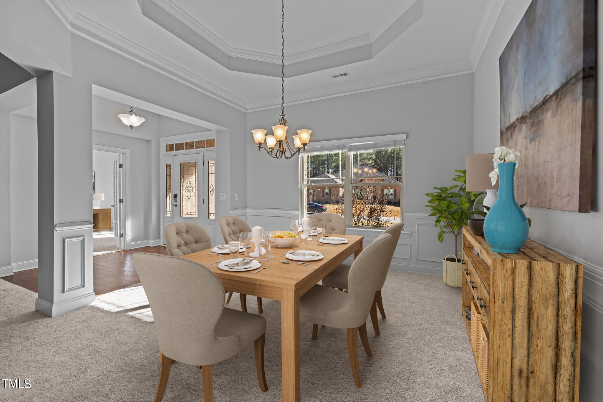 95 Windy Creek Drive Willow Spring, NC 27592 - Photo 6 of 55 a dining room with furniture a chandelier and window