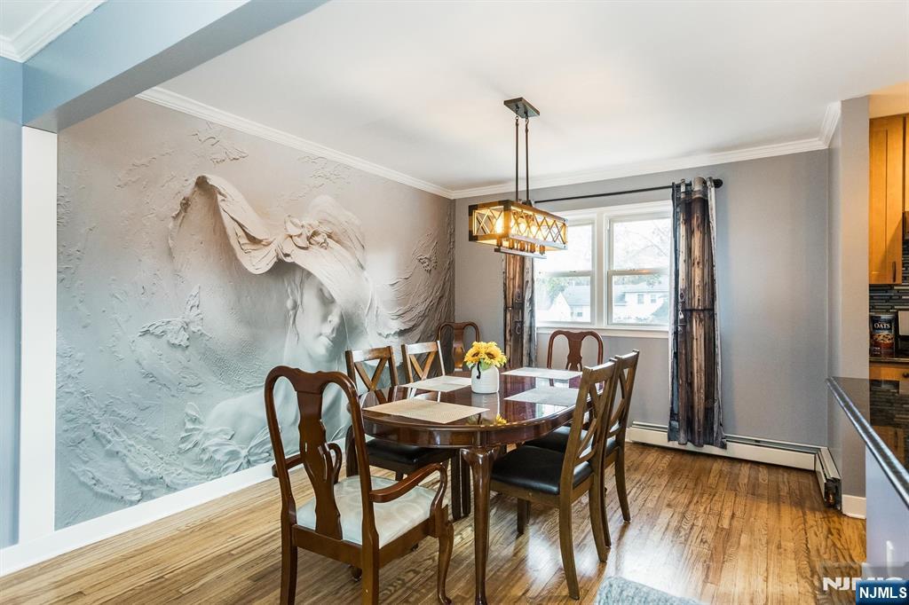 179 Grove Avenue Verona, NJ 07044 - Photo 16 of 34 a view of a dining room with furniture window and wooden floor