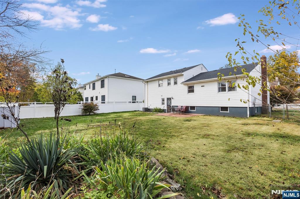 179 Grove Avenue Verona, NJ 07044 - Photo 34 of 34 a view of a house with a yard