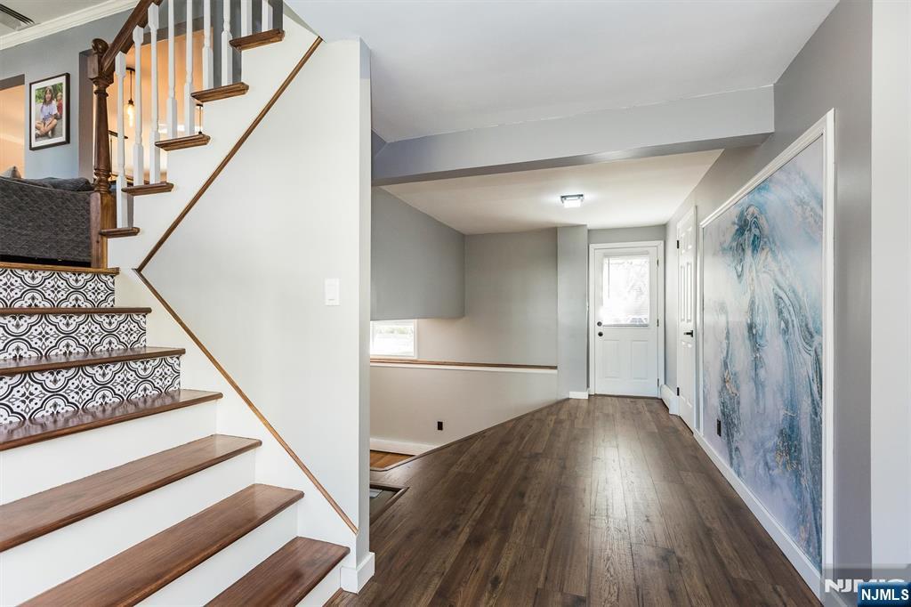 179 Grove Avenue Verona, NJ 07044 - Photo 6 of 34 a view of entryway with wooden floor