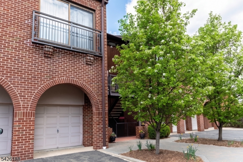 4 Millay Court Teaneck, NJ 07666 - Photo 16 of 32 a front view of a house with a tree
