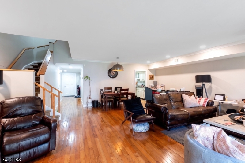 4 Millay Court Teaneck, NJ 07666 - Photo 18 of 32 a living room with furniture and wooden floor