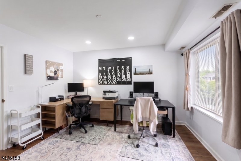 4 Millay Court Teaneck, NJ 07666 - Photo 27 of 32 a view of a workspace with furniture and a window