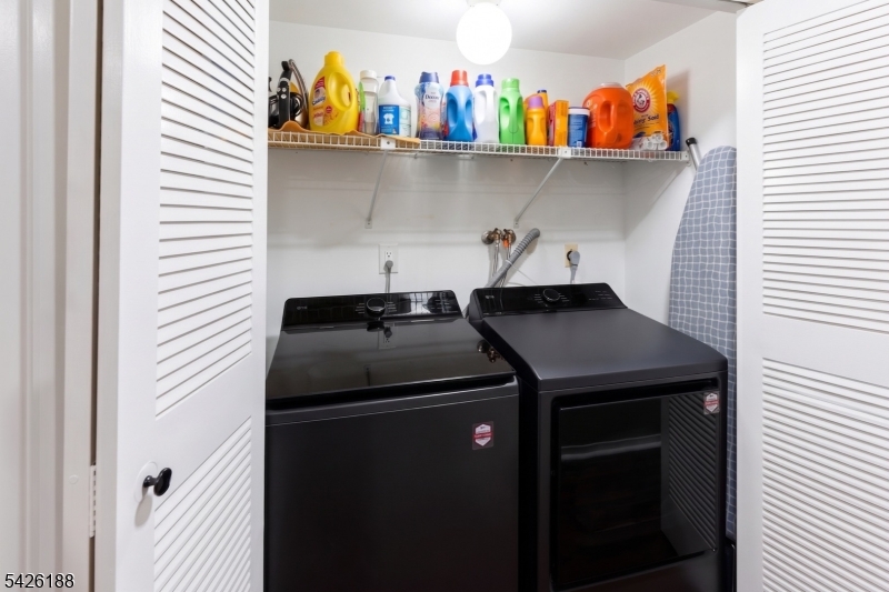 4 Millay Court Teaneck, NJ 07666 - Photo 28 of 32 a utility room with dryer and washer