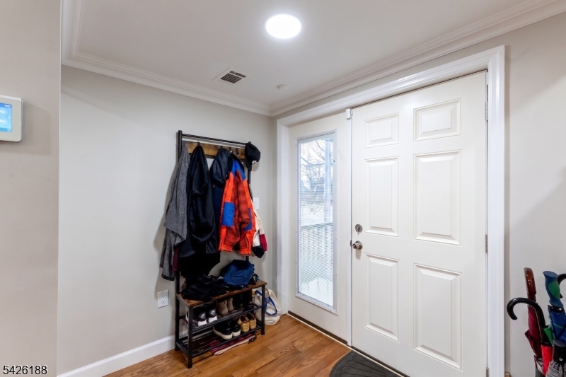 4 Millay Court Teaneck, NJ 07666 - Photo 8 of 32 a view of a room with gym equipment