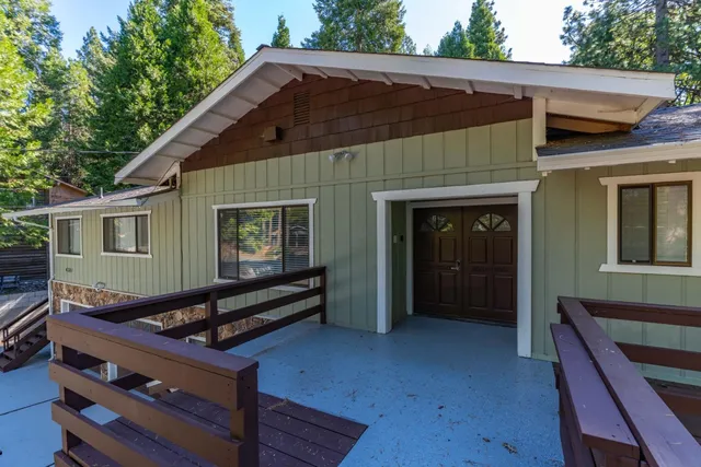 a bedroom with furniture and wooden floor
