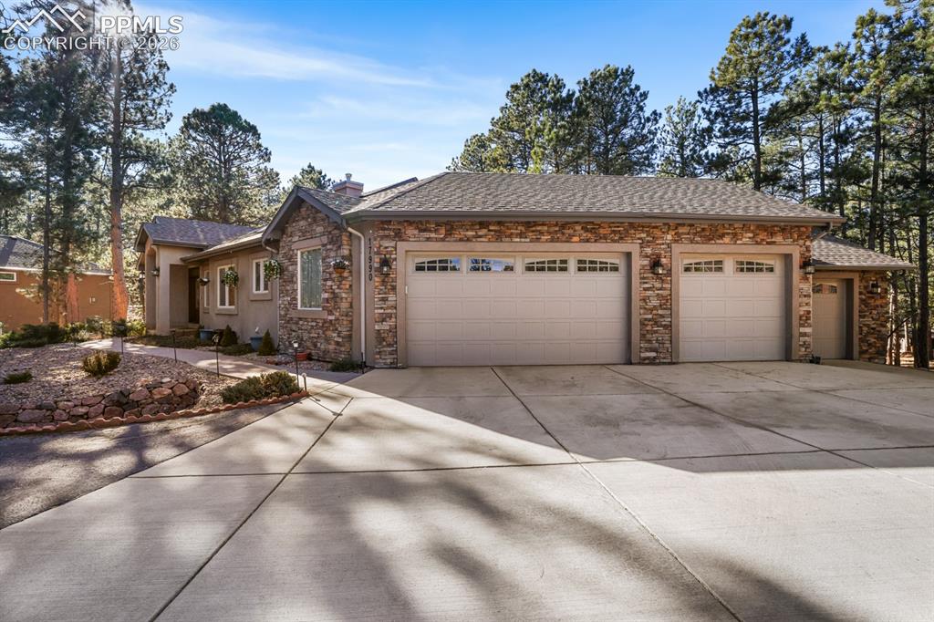 17990 Sawmill Road Colorado Springs, CO 80908 - Photo 6 of 40 Attached garage with workshop capabilities
