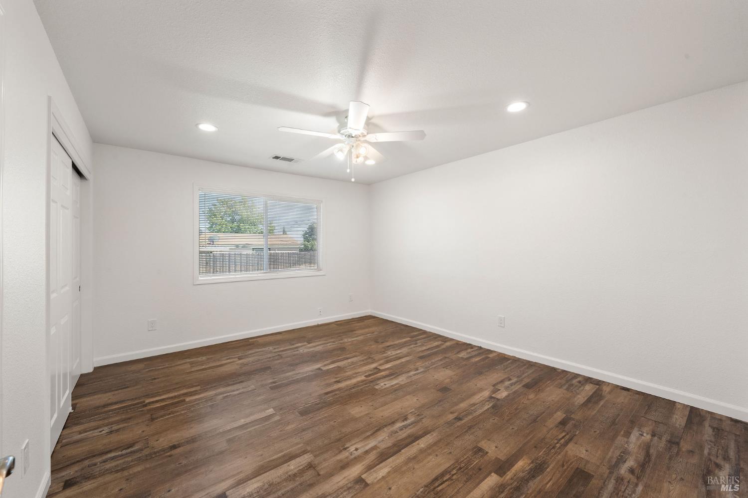 543 St Francis Way Rio Vista, CA 94571 - Photo 15 of 44 primary bedroom with LVP floors and ceiling fan