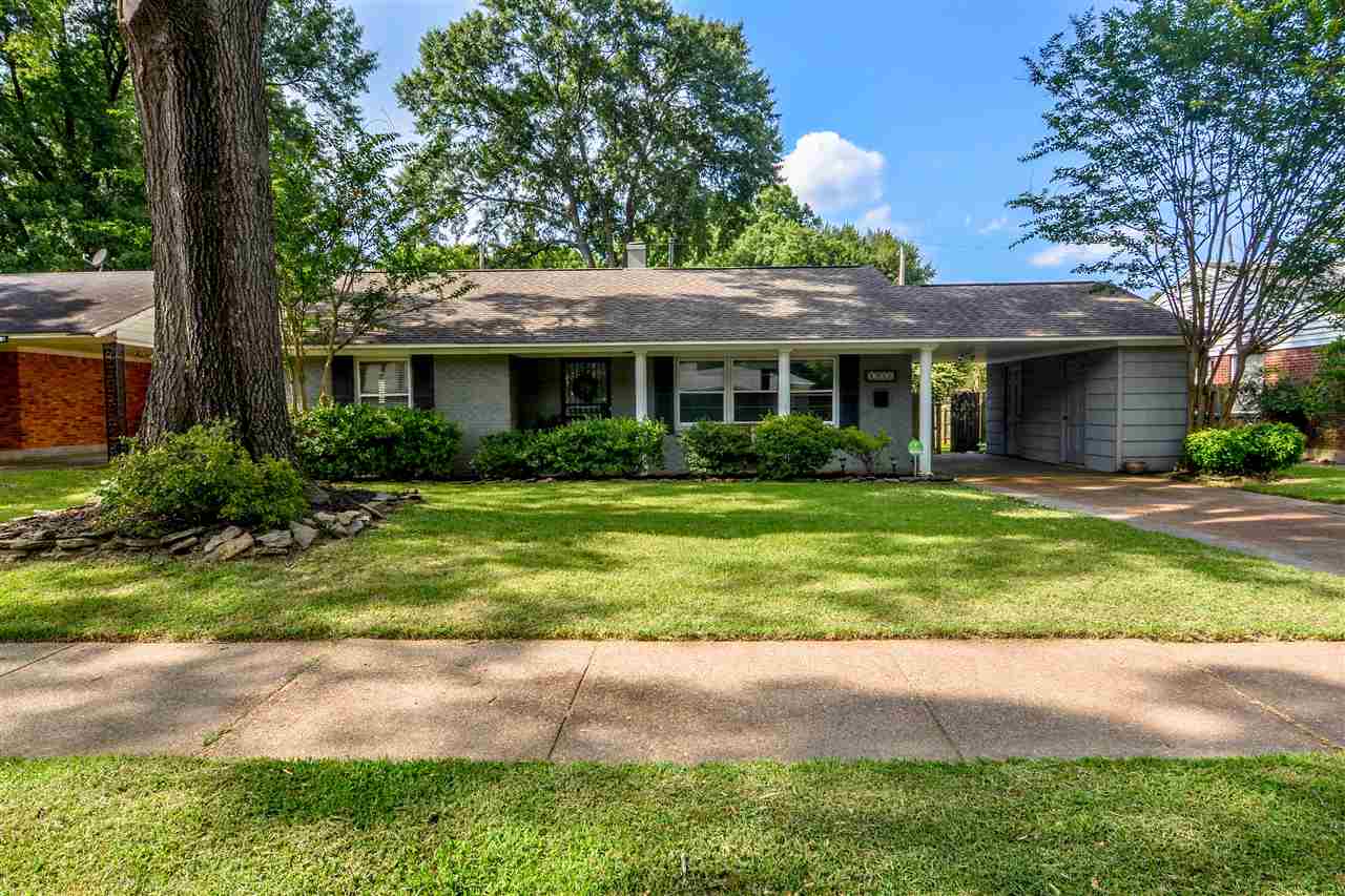 4856 Dee Road Memphis, TN 38117 - Photo 1 of 25 a front view of house with yard and green space