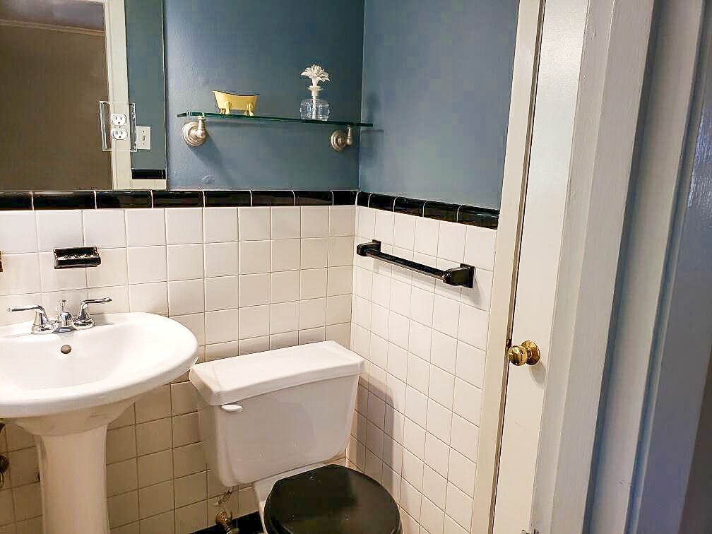 4856 Dee Road Memphis, TN 38117 - Photo 18 of 25 a bathroom with a sink a toilet and shower