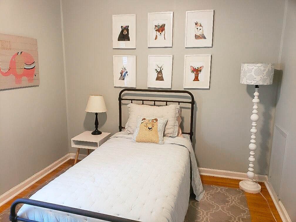 4856 Dee Road Memphis, TN 38117 - Photo 19 of 25 a bedroom with a bed and painting on the wall