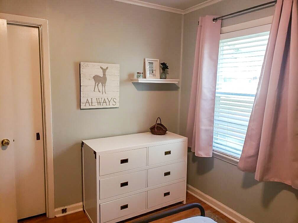 4856 Dee Road Memphis, TN 38117 - Photo 20 of 25 a bedroom with a bed and a window