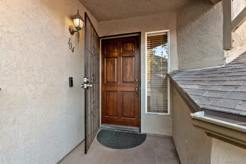 a view of a livingroom with wooden floor a fireplace