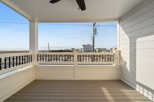 a view of a balcony with a street