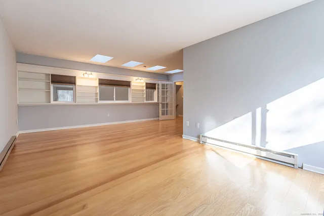 a bathroom with a sink toilet and vanity