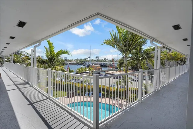 a view of balcony with furniture