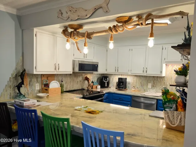 $430,000 | 650 Salter Path Road, Unit 203, Pine Knoll Shores, NC 28512