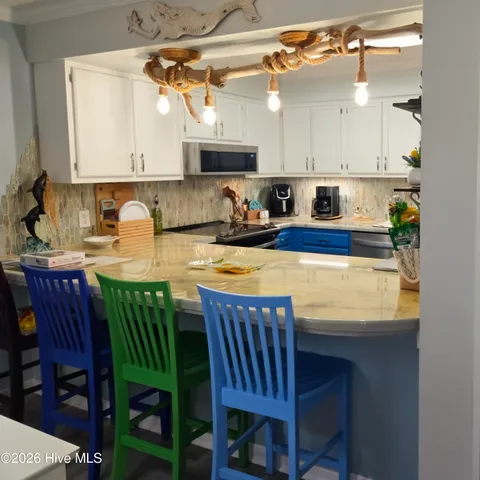 $430,000 | 650 Salter Path Road, Unit 203, Pine Knoll Shores, NC 28512