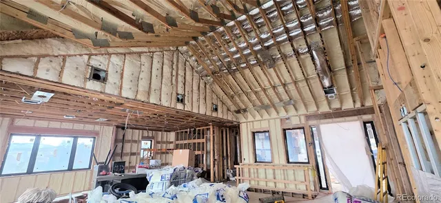 a living room with furniture or flat screen tv and a fireplace