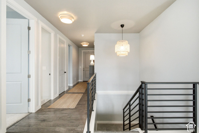 986 South Old Farm Road Heber City, UT 84032 - Photo 6 of 51 Wood-finish flooring with a modern staircase featuring black metal railings