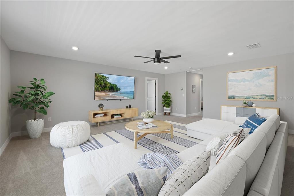 3508 Anchor Bay Trail Lakewood Ranch, FL 34211 - Photo 27 of 74 a bedroom with furniture and a large window