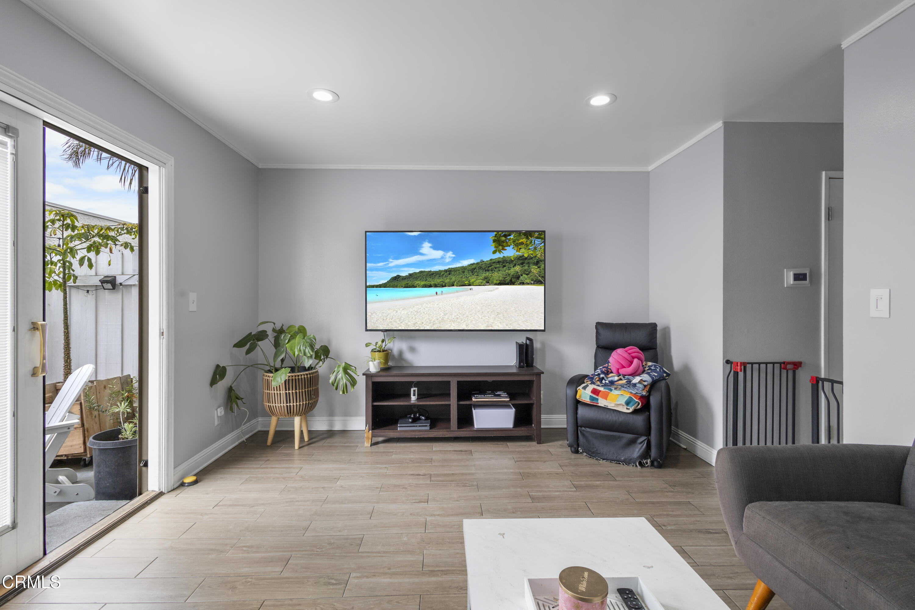3235 Kelp Lane Oxnard, CA 93035 - Photo 11 of 22 a living room with furniture and a flat screen tv