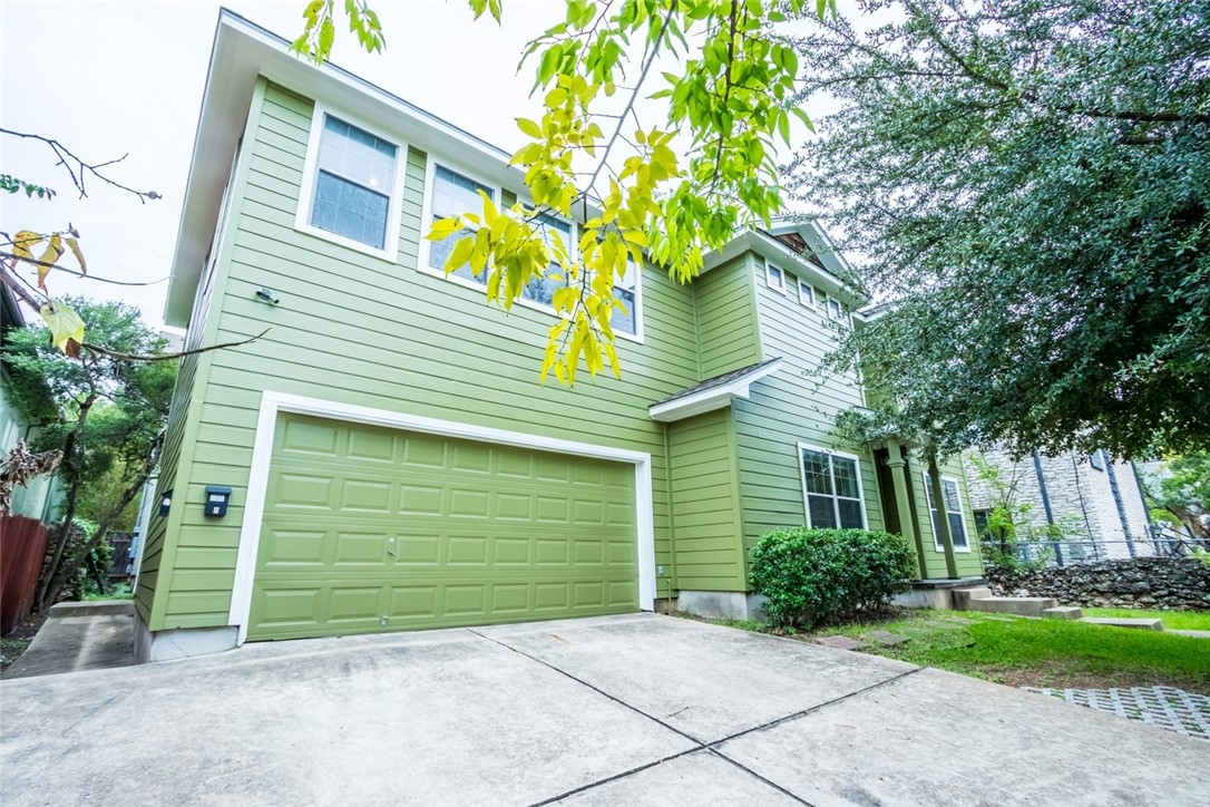 306 East 34th Street, Unit A Austin, TX 78705 - Photo 25 of 25 a front view of a house with garden