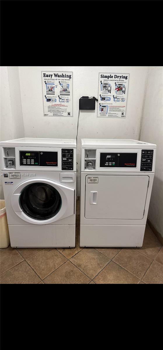 1673 Bay Road, Unit 303 Miami Beach, FL 33139 - Photo 9 of 10 a view of kitchen with a stove top oven