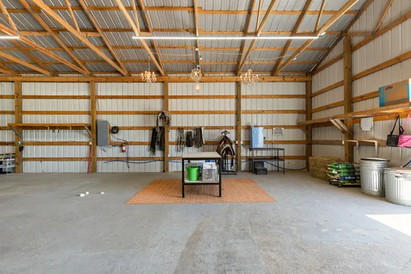 a view of a room with furniture and a chandelier
