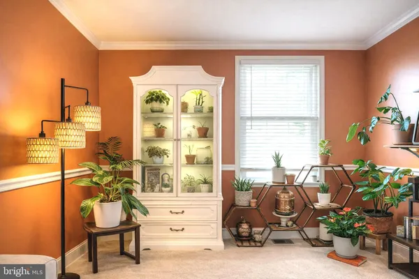 a room with a window and gym equipment