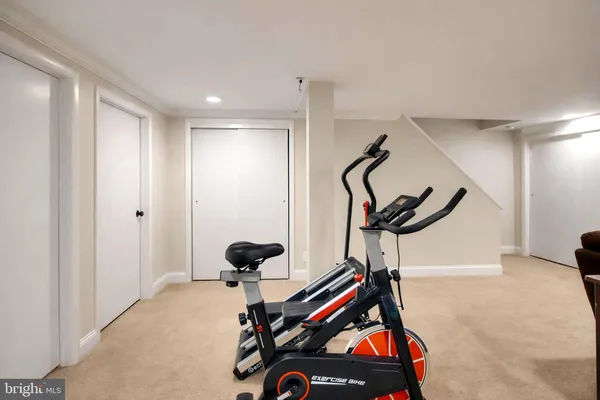 a livingroom with furniture and a flat screen tv