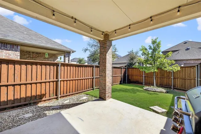 a view of a backyard with a garden