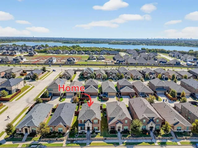 an aerial view of residential building with parking space