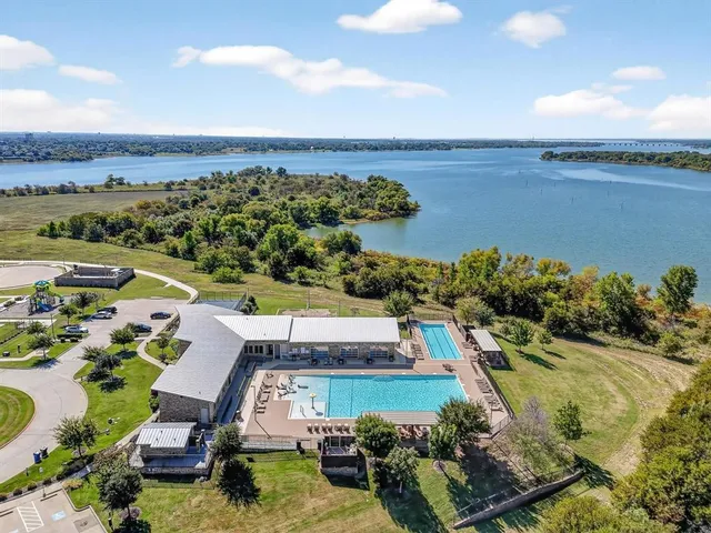 an aerial view of a house with a garden