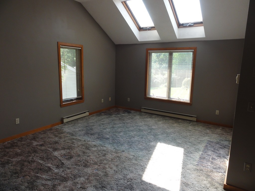 132 Groton Road Shirley, MA 01464 - Photo 18 of 29 an empty room with windows