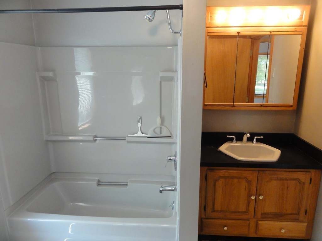 132 Groton Road Shirley, MA 01464 - Photo 19 of 29 a bathroom with a sink and a mirror