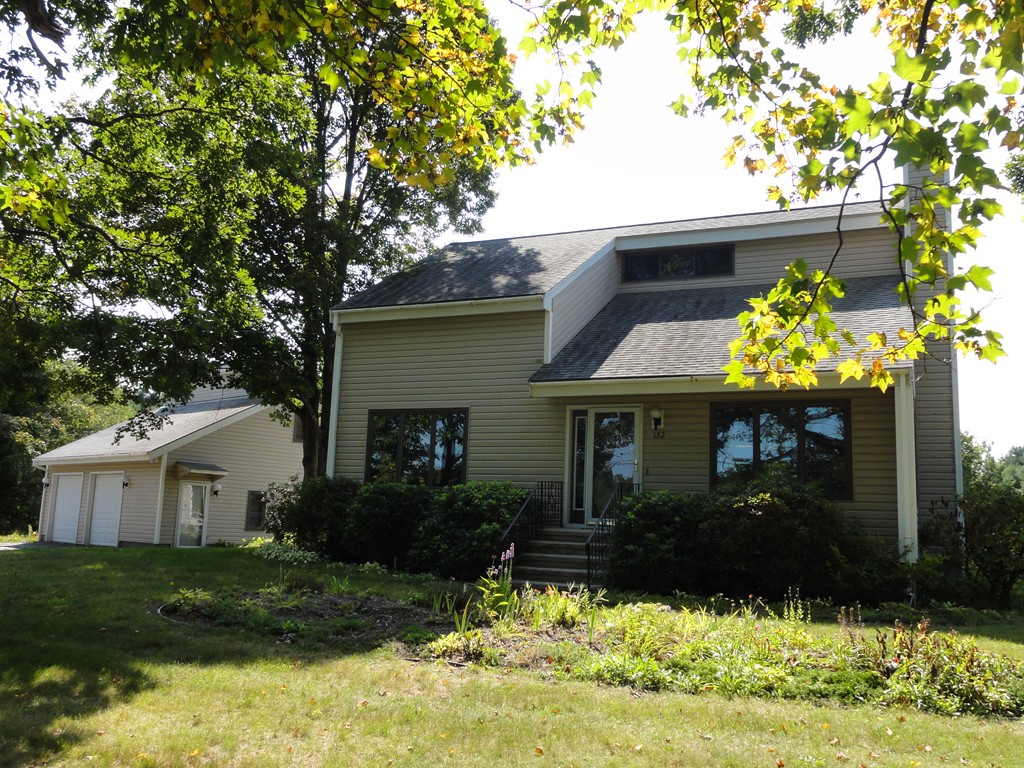 132 Groton Road Shirley, MA 01464 - Photo 2 of 29 a front view of house with yard