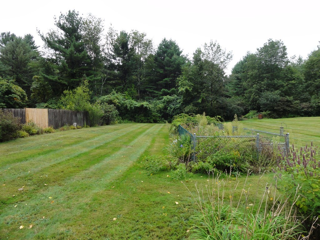 132 Groton Road Shirley, MA 01464 - Photo 23 of 29 a view of a lush green space