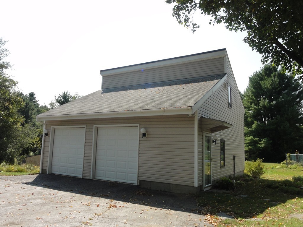 132 Groton Road Shirley, MA 01464 - Photo 25 of 29 a front view of a house