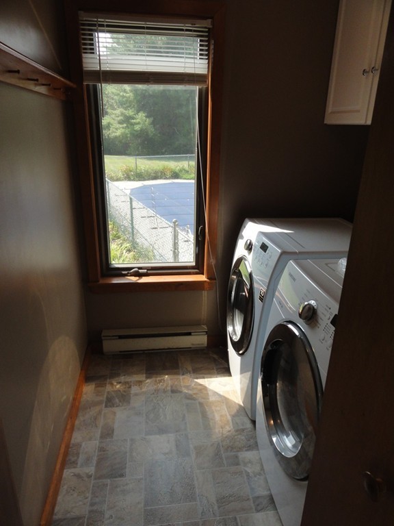 132 Groton Road Shirley, MA 01464 - Photo 4 of 29 a utility room with dryer and washer