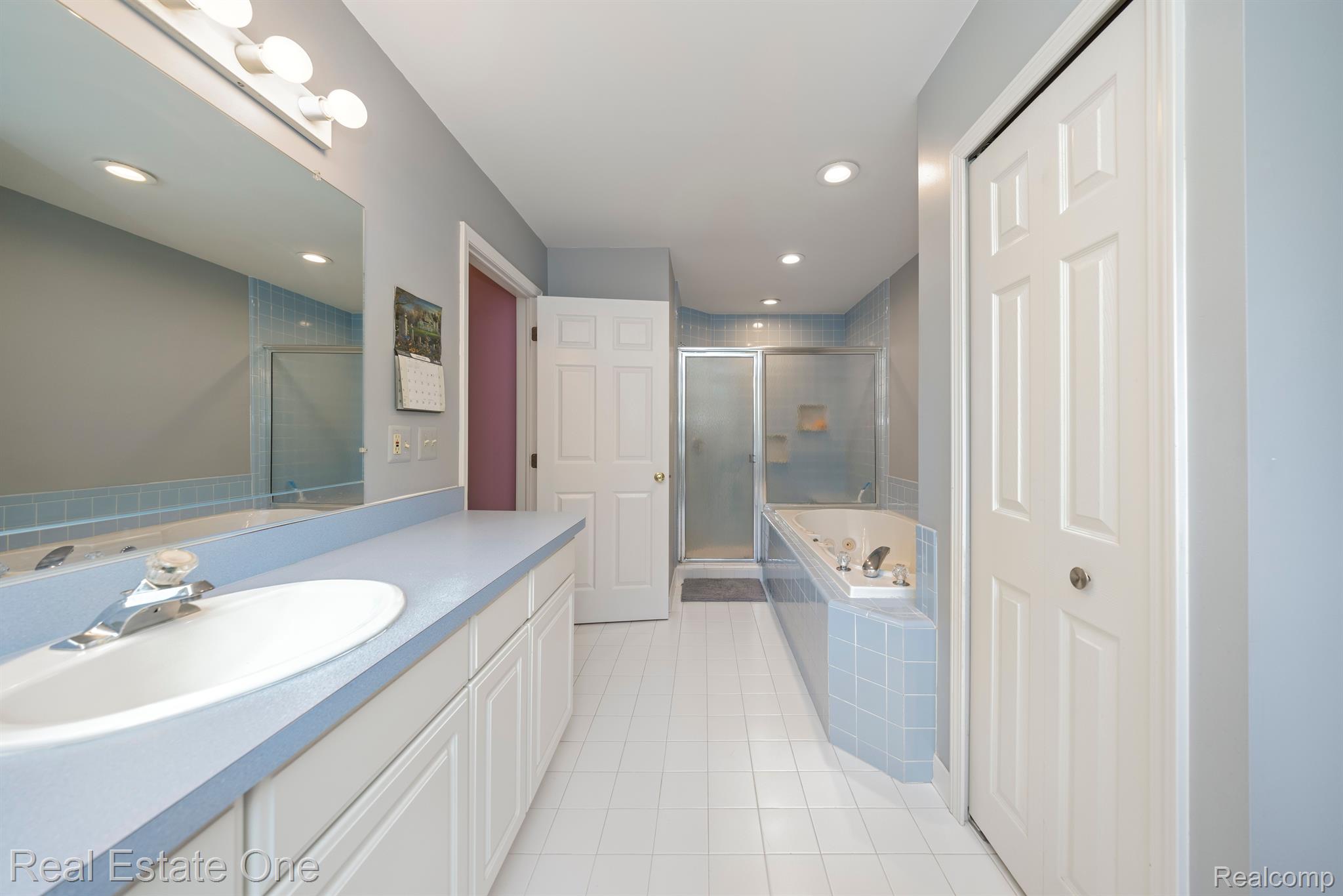 2520 South Commerce Road Walled Lake, MI 48390 - Photo 24 of 56 Primary Bathroom ceramic flooring separate shower